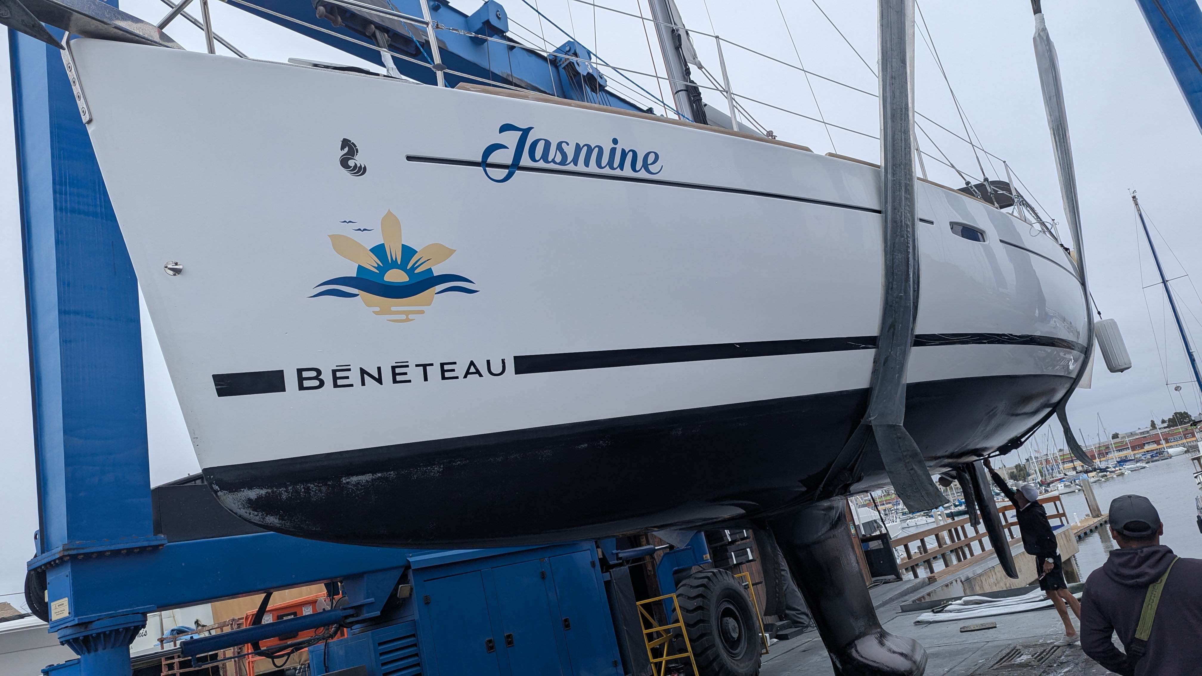 Bow of sailboat being hoisted out of the water